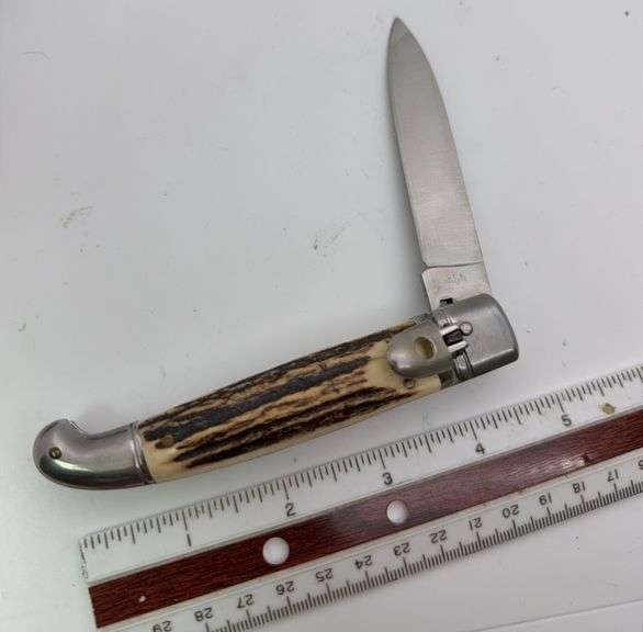 D.E.S Garantie stag handle automatic knife