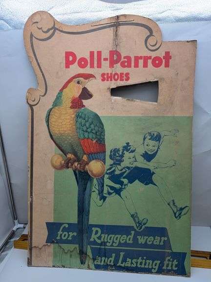 Poll parrot shoes cardboard sign