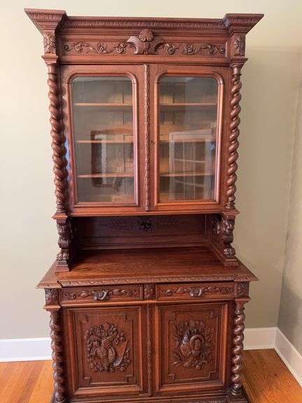 English oak cupboard 52”x24x98” winged griffins
