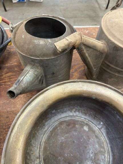 Brass buckets, watering cans