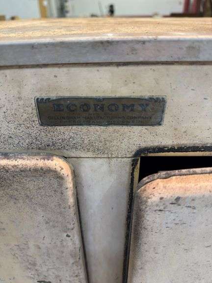 Metal ice box, screw comes out of back leg 34x16x48