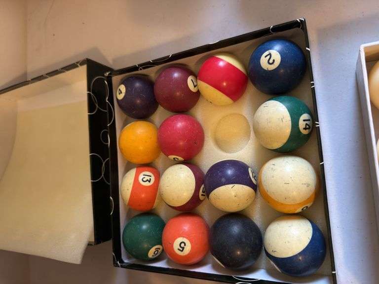 Pool balls, chalk, Budweiser, camel and other cues etc