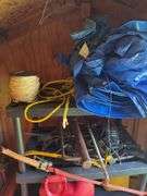 Post driver, shelf, gas cans etc