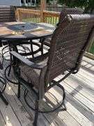 40” round outdoor table and barstools