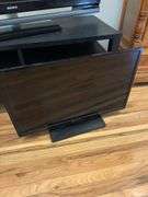 52” and 32” hd tvs with stand