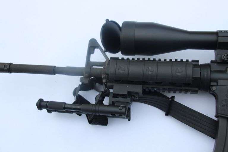 Bushmaster XM15-E2s  6.8 mm  with scope