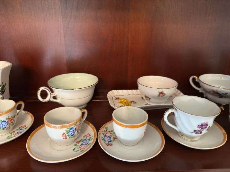 Assorted cups and saucers
