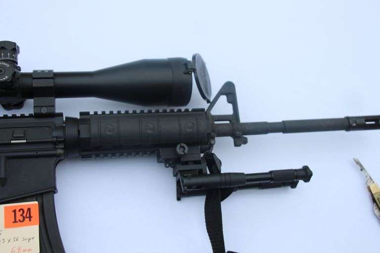 Bushmaster XM15-E2s  6.8 mm  with scope