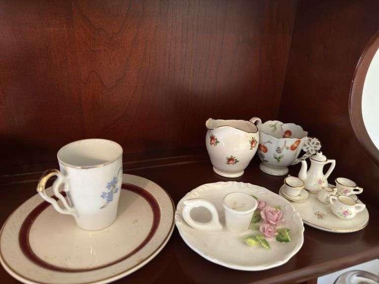 Assorted cups and saucers