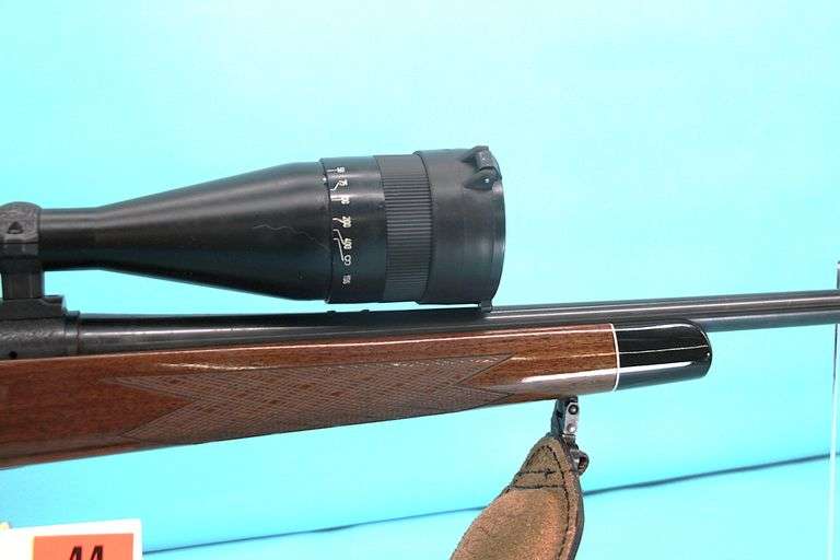 Remington 700 .17 Rem  Pres. Grade scrolling with scope