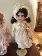 (2) porcelain dolls