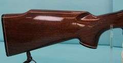 Remington 700 .17 Rem  Pres. Grade scrolling with scope