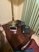 Phones, pillows floor lamp, table