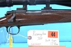 Remington 700 .17 Rem  Pres. Grade scrolling with scope
