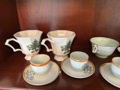Assorted cups and saucers