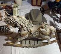 Boyd bears, doll rocking horses, hat etc