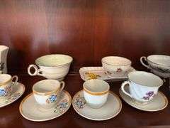 Assorted cups and saucers