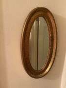 (2) oval mirrors largest 24”x34”