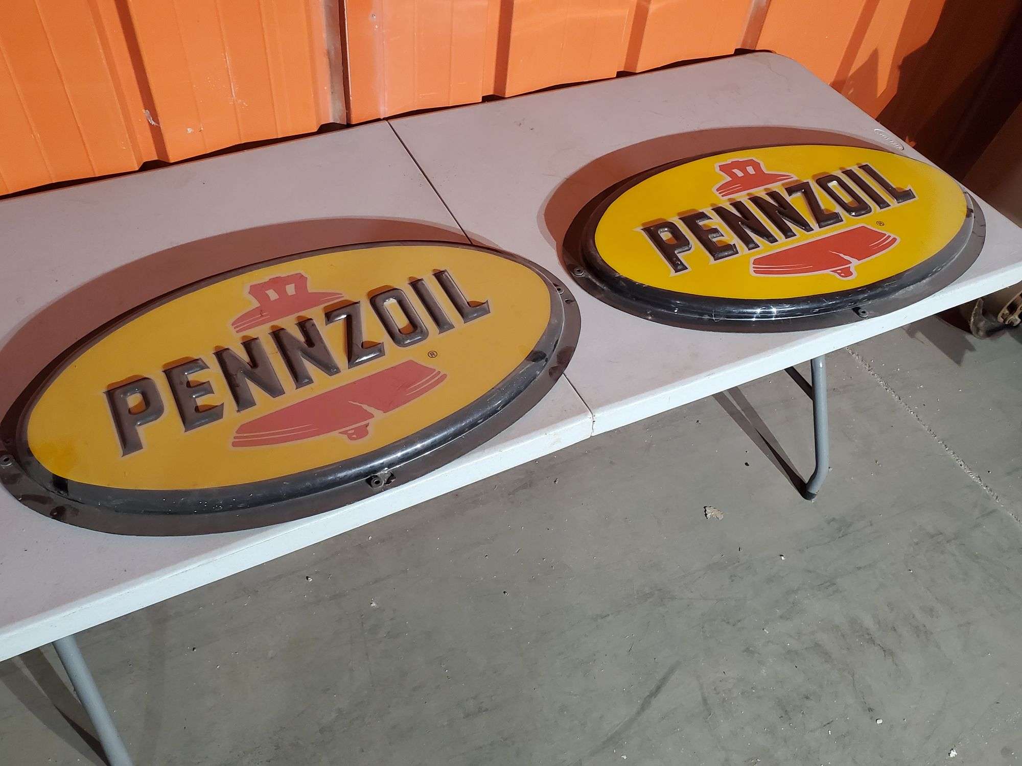 2) Plastic Pennzoil Signs - Gavel Roads Online Auctions