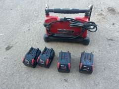 Milwaukee Multi Bay Charger with (4) Batteries