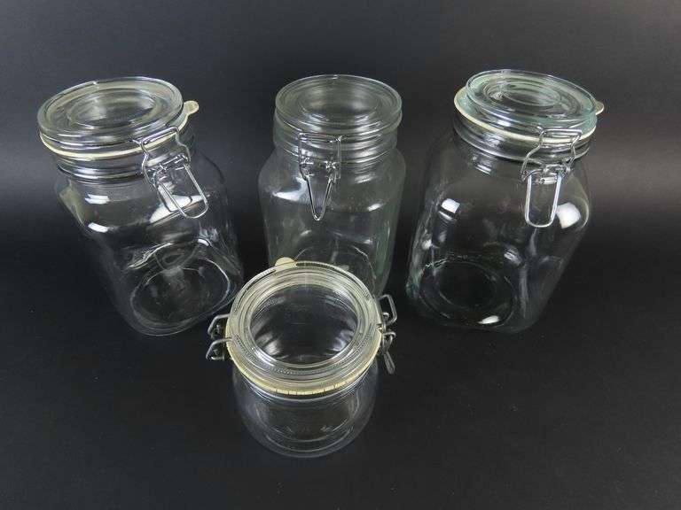 Lot of 4 Glass Cannisters with Lids