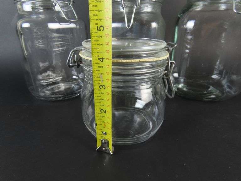 Lot of 4 Glass Cannisters with Lids