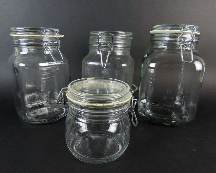 Lot of 4 Glass Cannisters with Lids