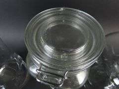 Lot of 4 Glass Cannisters with Lids