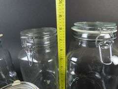 Lot of 4 Glass Cannisters with Lids