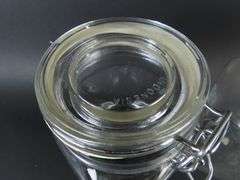 Lot of 4 Glass Cannisters with Lids