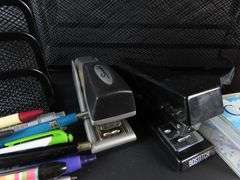 Collection of Office Supplies with Letter Organizers