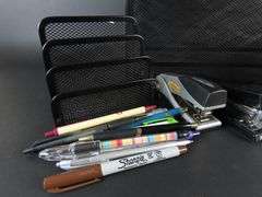Collection of Office Supplies with Letter Organizers