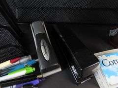 Collection of Office Supplies with Letter Organizers