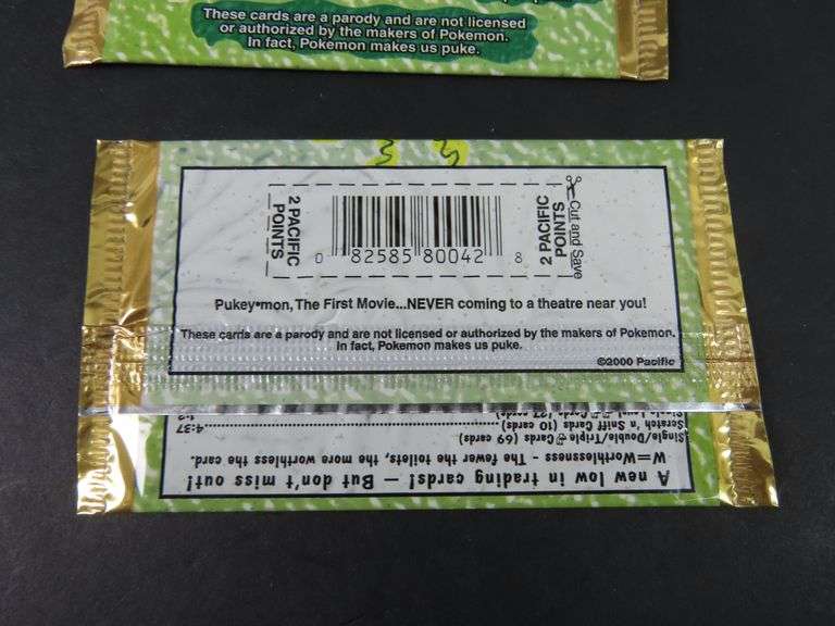 Lot of 2 "Pukey-Mon" Sealed Trading Card Packs