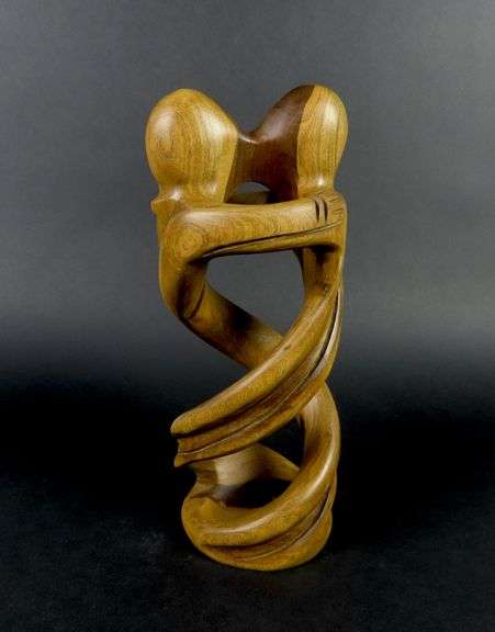 Handcrafted Carved Wooden Sculpture of a Couple Embracing