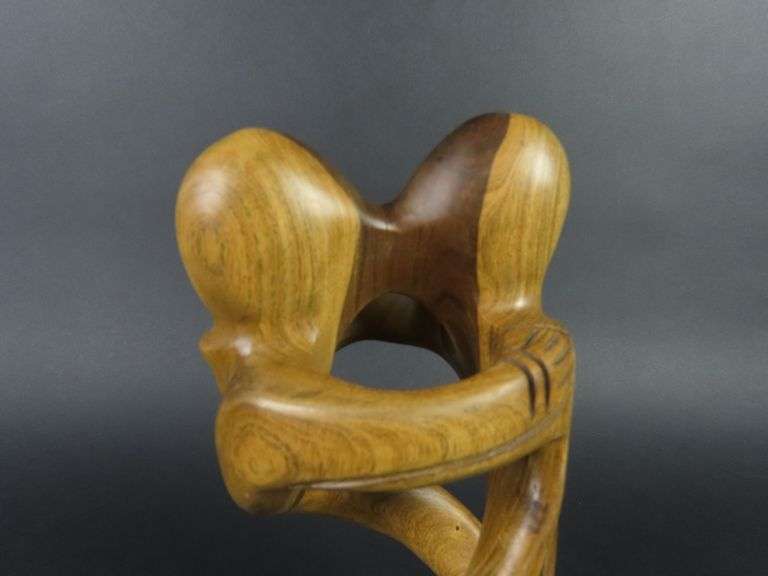Handcrafted Carved Wooden Sculpture of a Couple Embracing