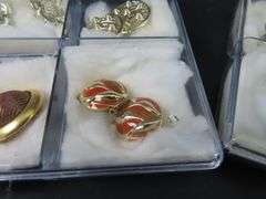 12 Pairs of Vintage Clip Earrings in Plastic Storage Cases