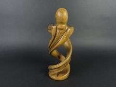 Handcrafted Carved Wooden Sculpture of a Couple Embracing