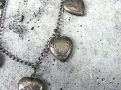 7" Sterling Silver Bracelet with Etched Heart Pendants - 8g
