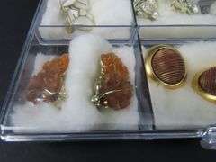 12 Pairs of Vintage Clip Earrings in Plastic Storage Cases