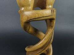 Handcrafted Carved Wooden Sculpture of a Couple Embracing