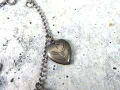 7" Sterling Silver Bracelet with Etched Heart Pendants - 8g