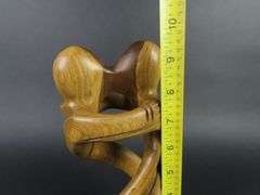 Handcrafted Carved Wooden Sculpture of a Couple Embracing