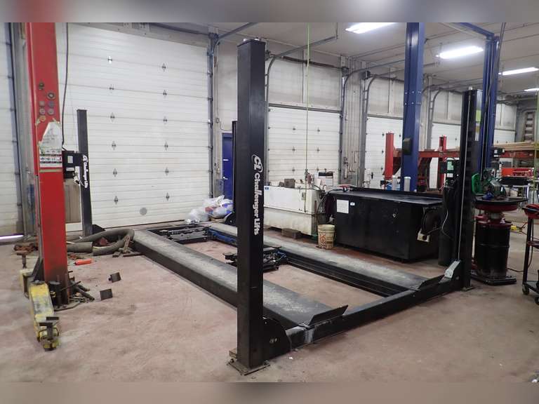 2023 Challenger "4015EFX" 15,000lbs Cap 4-Post Hoist w/(2) Rolling Jacks.**LOADING SPECIAL TERMS**