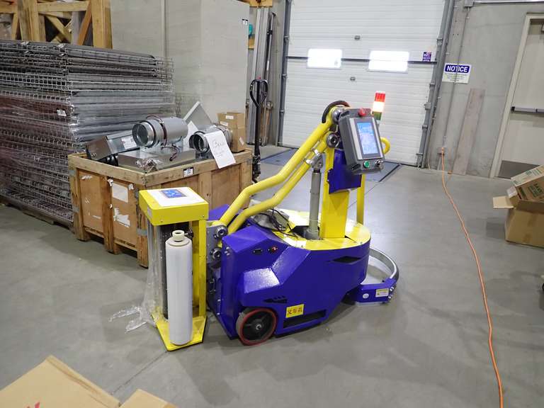 Self Propelled  Wrapping Machine w/ (4) Boxes Wrap.