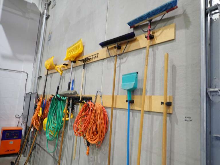 Lot of Asst. Brooms, Snow Shovels, Electrical Cords, Hose, etc.