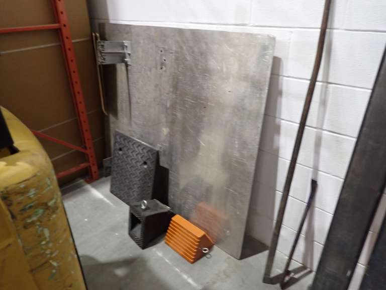 Lot of (2) Dock Plates and (3) Wheel Chocks.