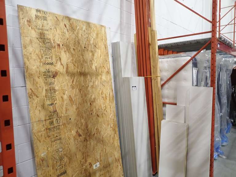 Lot of Asst. Plywood, Particle Board, 2x4's and Approx. (28)Laminated Shelves.