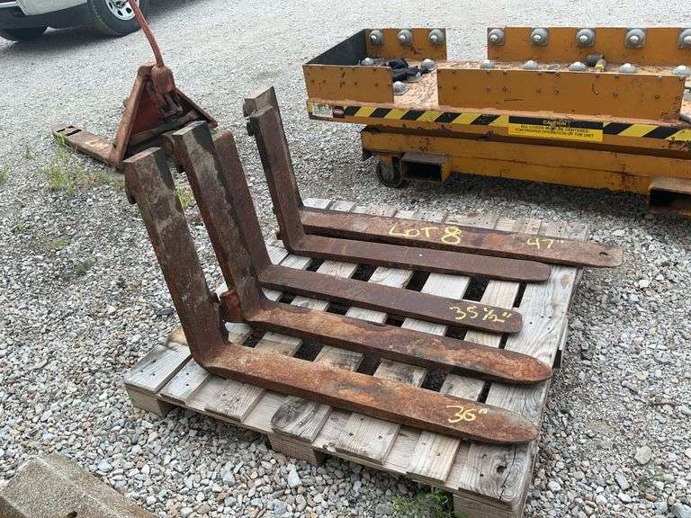 2 sets of pallet forks and 1 single fork