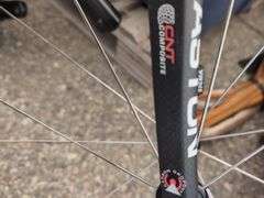 Assorted Sports Gear, Bike/Running Shoes, and Disassembled Bicycle